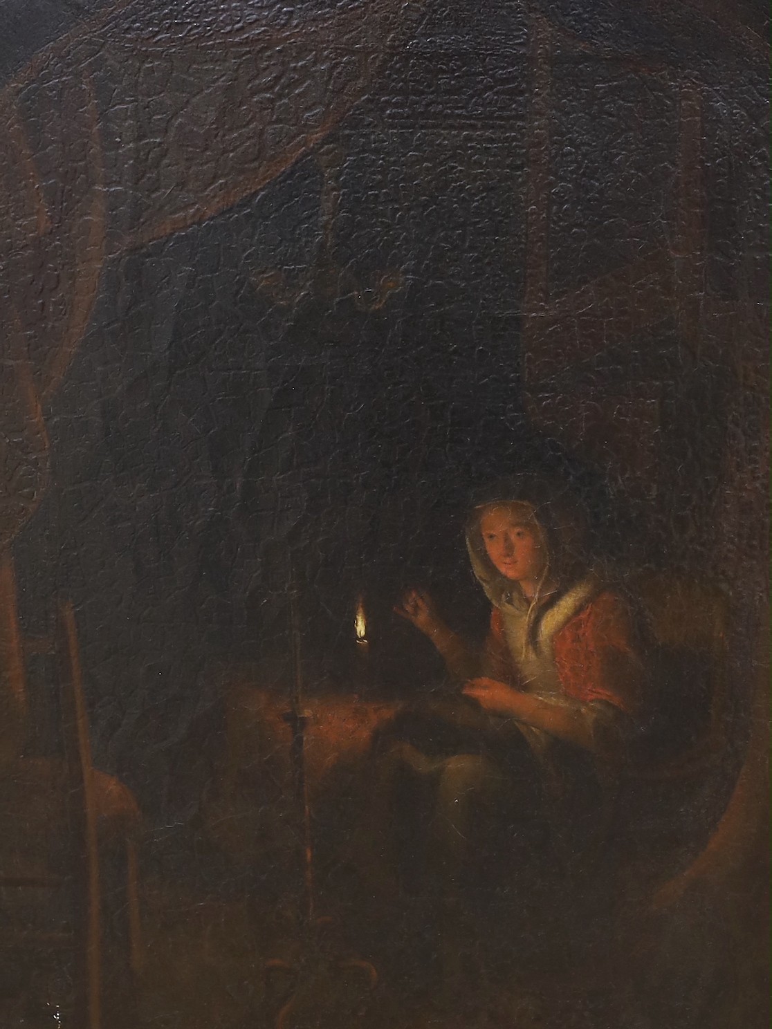 Manner of Godfried Schalcken (Dutch, 1643-1706), oil on canvas, Figure working beside candlelight, label to reverse, 43 x 32cm